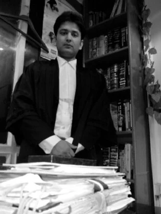 Advocate Aseem Shrivastava in advocate's robes at his office in Indore